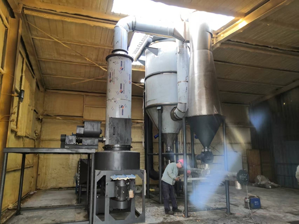 Rotating flash dryer